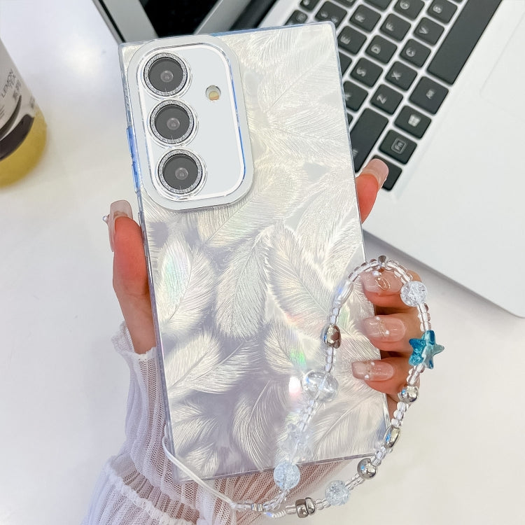 For Samsung Galaxy S25 5G Plating Glitter Texture Chain Wristband TPU Phone Case with Lens Film(White Feathers) - Galaxy S25 5G Cases by PMC Jewellery | Online Shopping South Africa | PMC Jewellery | Buy Now Pay Later Mobicred